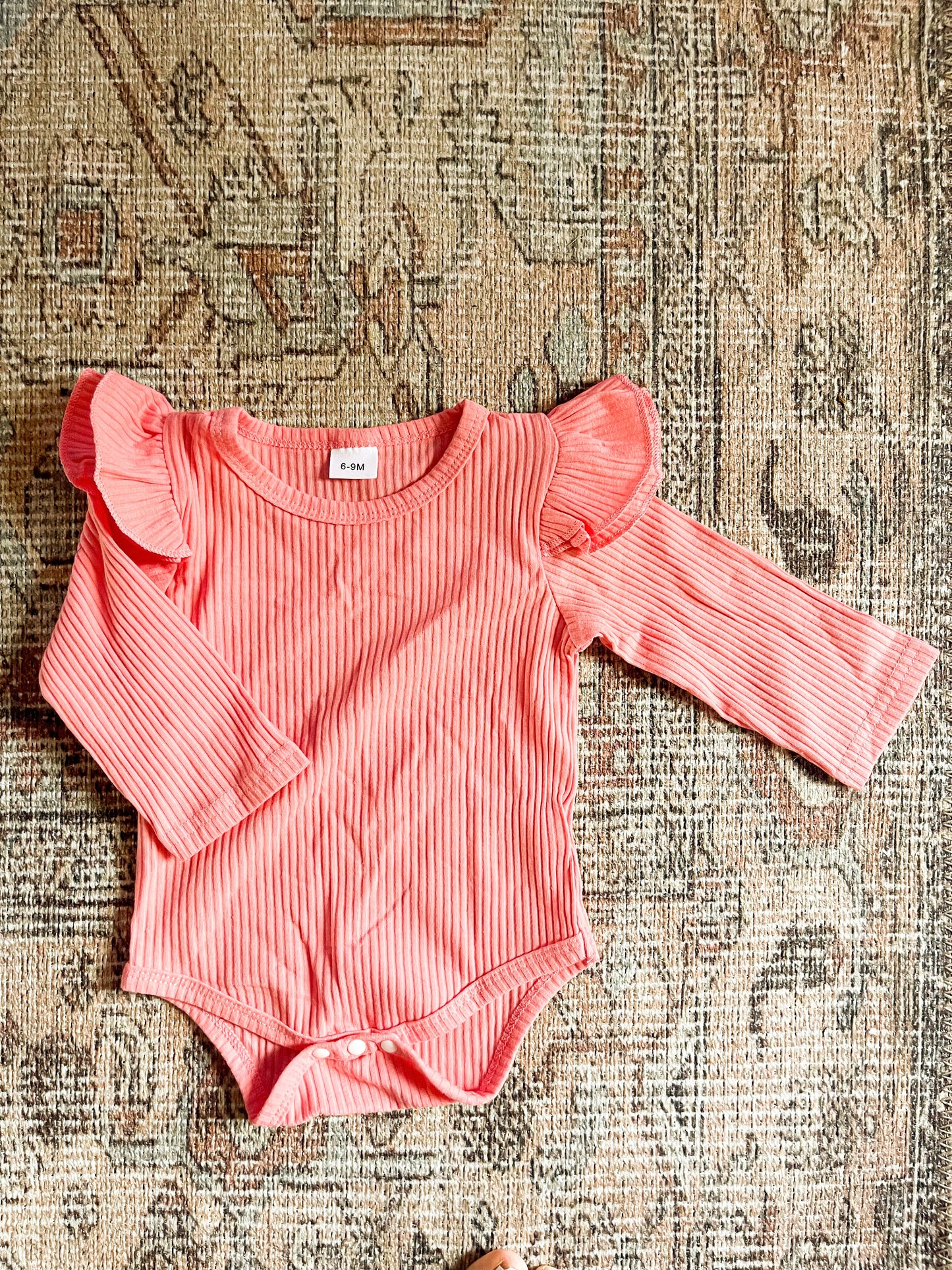 Ruffle sleeve onesie