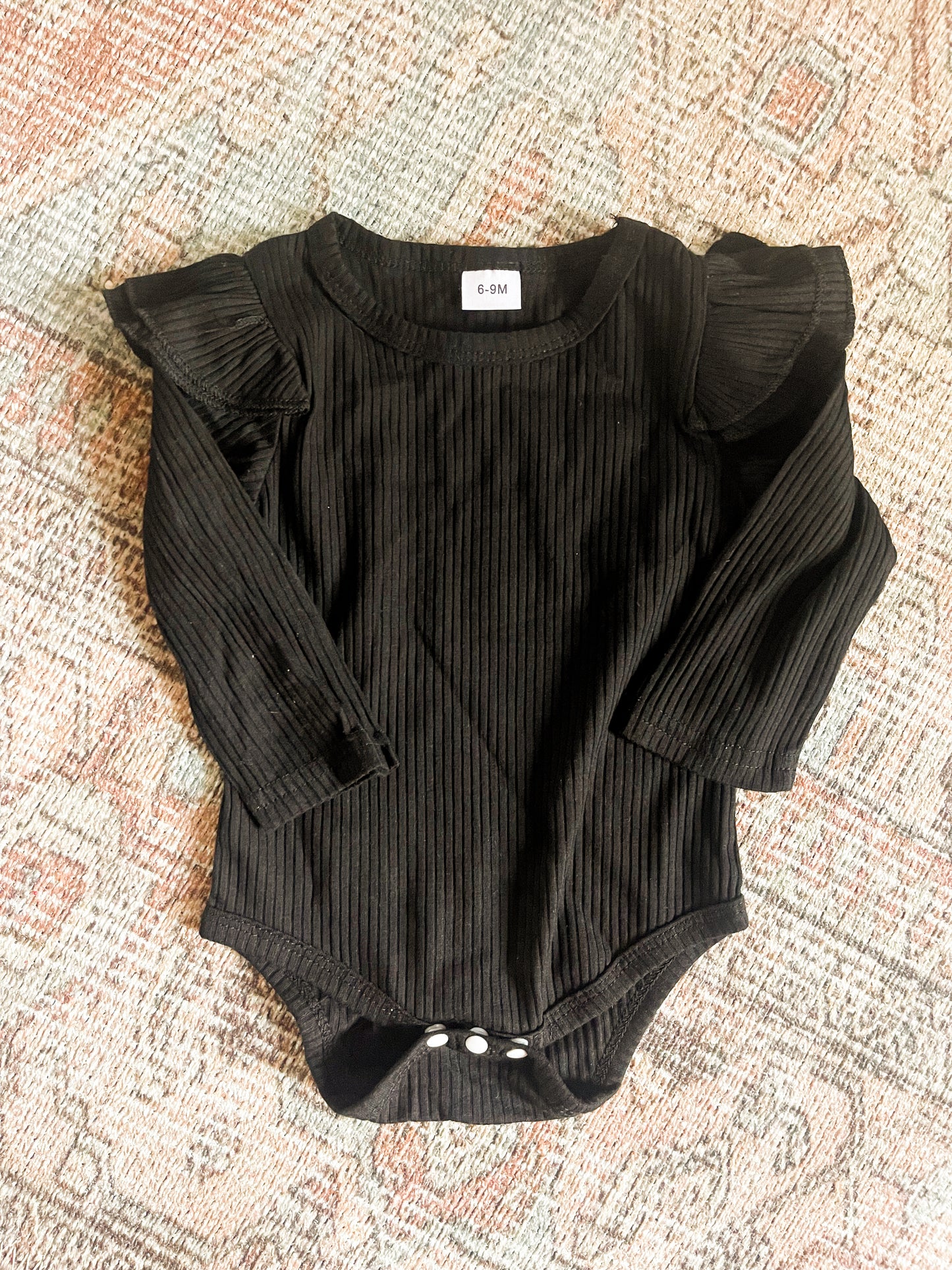Ruffle sleeve onesie