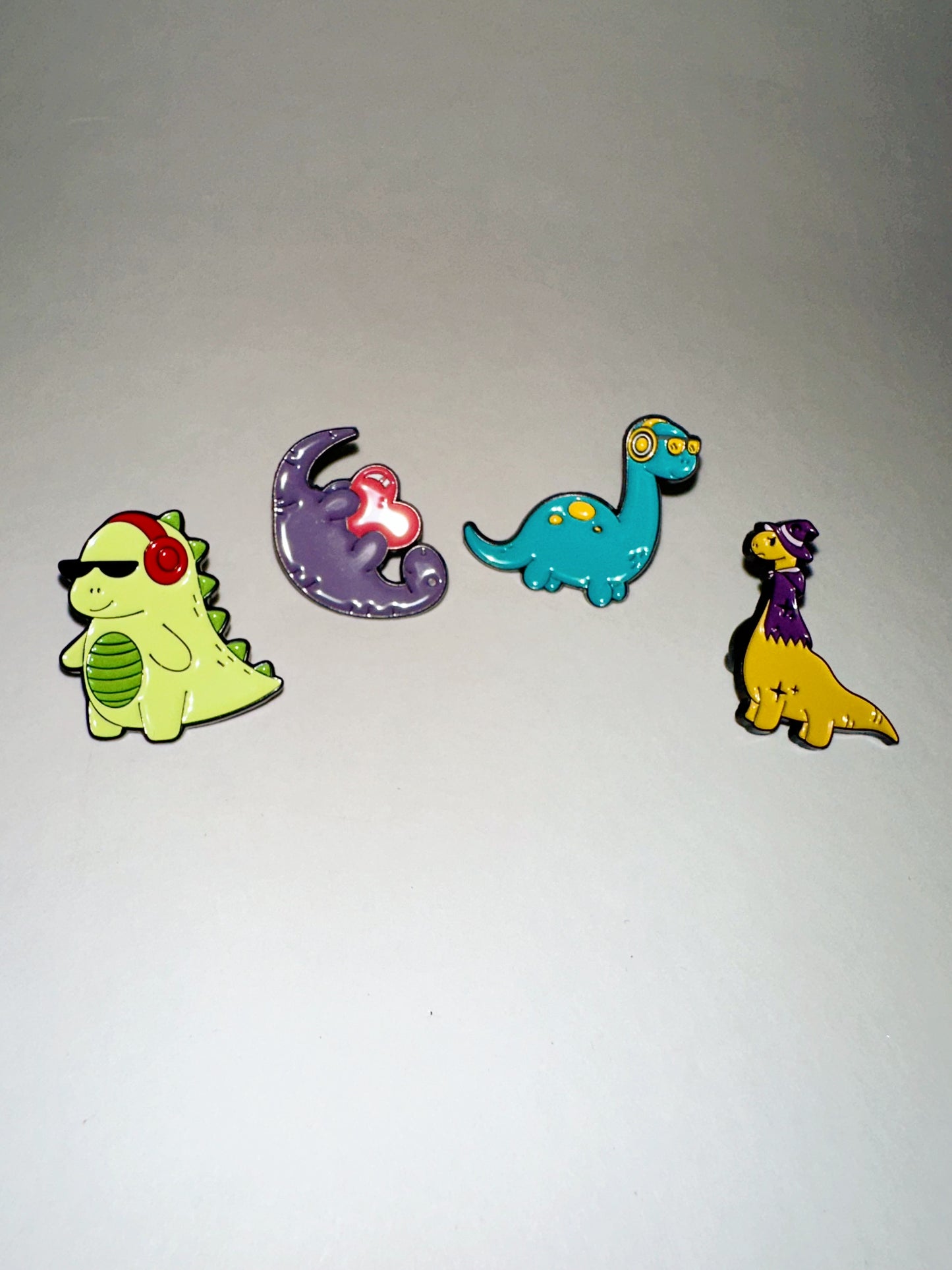 Dinosaur enamel pin