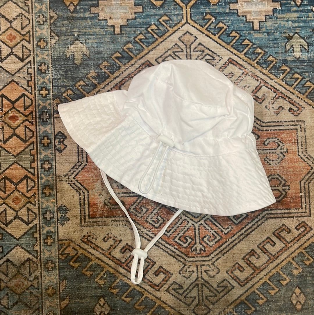 Baby’s white bucket hat
