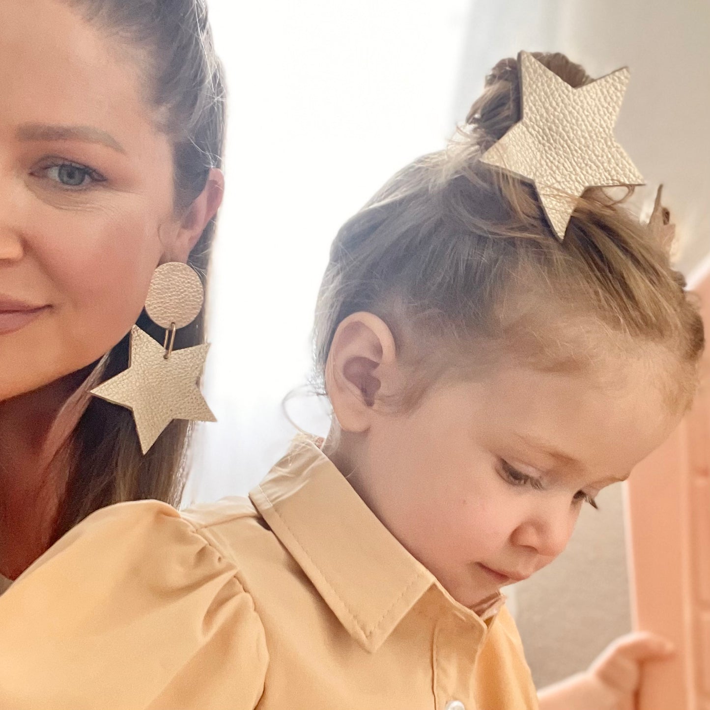 Champagne star earrings