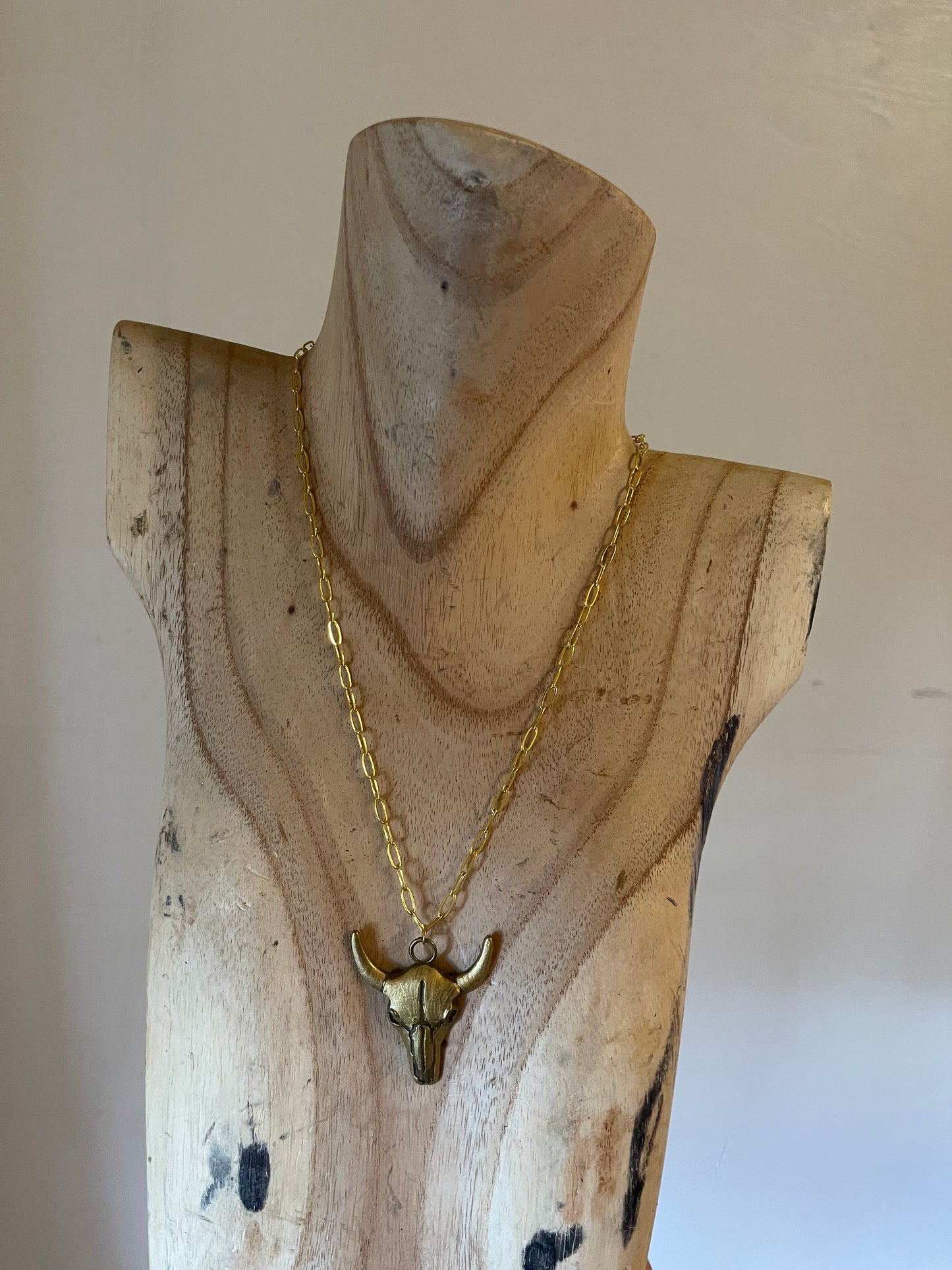 Thin gold steer head necklace