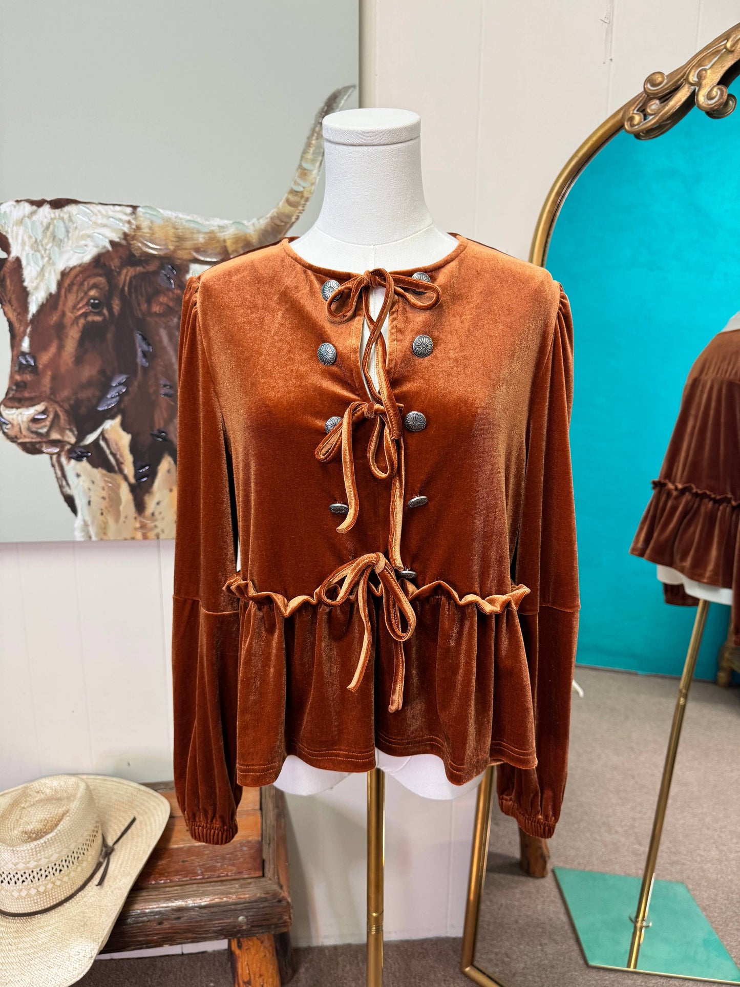 Rust velvet long sleeve peplum top, bow ties & conchos