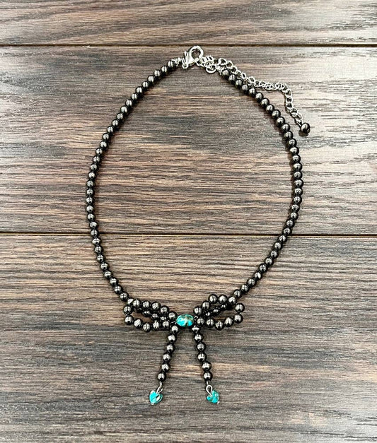 739623, Handmade 17" Bow, 6mm Polish Navajo Bead Necklace