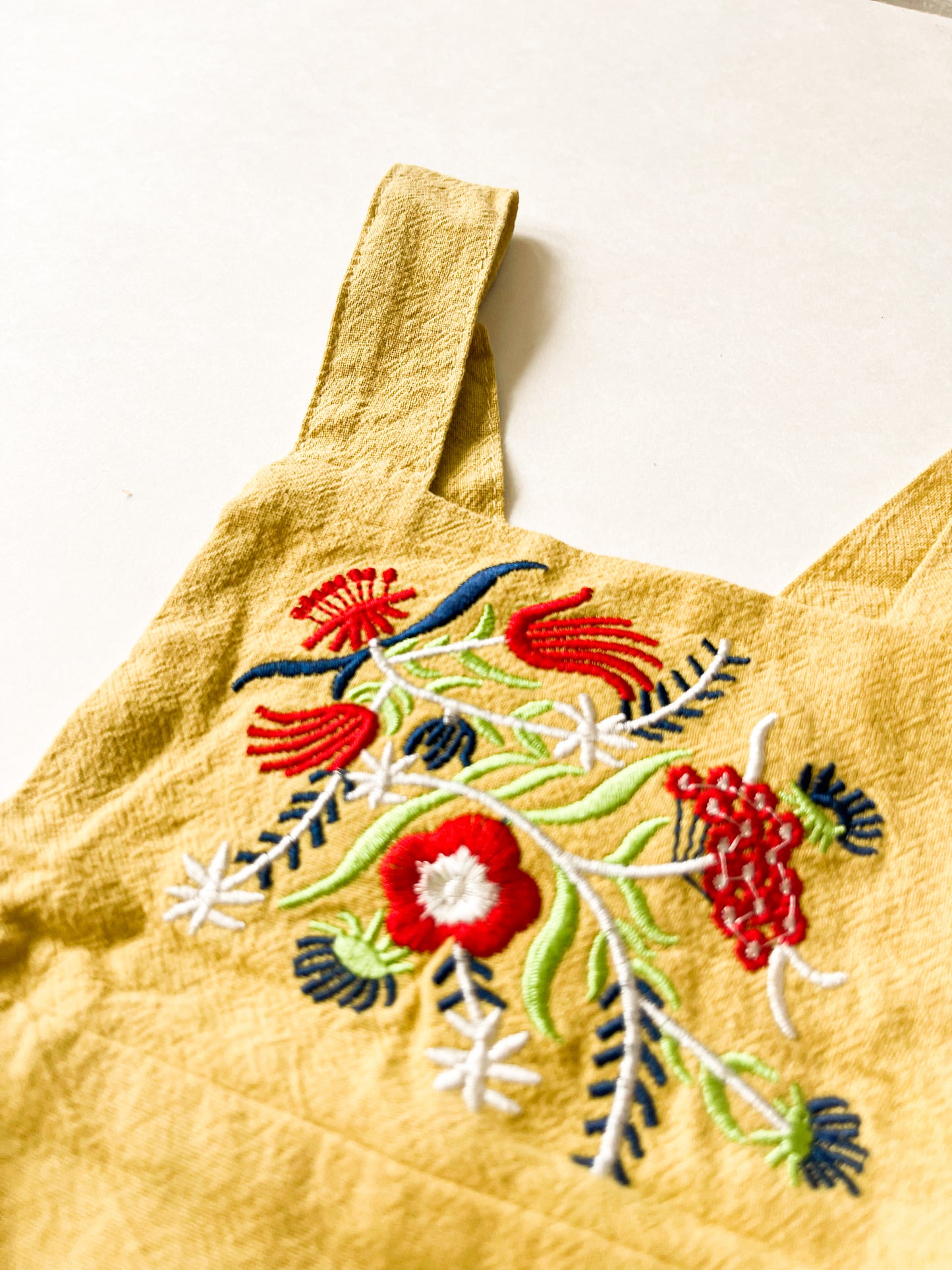Yellow Embroidered Ruffle Onesie